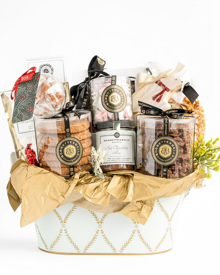 Luxury holiday gift basket with cookies, hot chocolate, marshmallows, and sweets